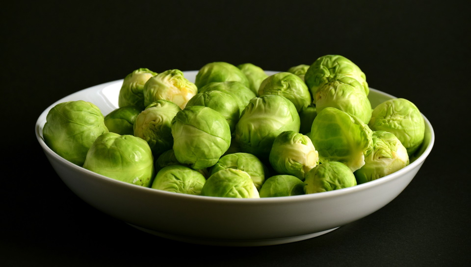 Brussels sprouts in a white bowl